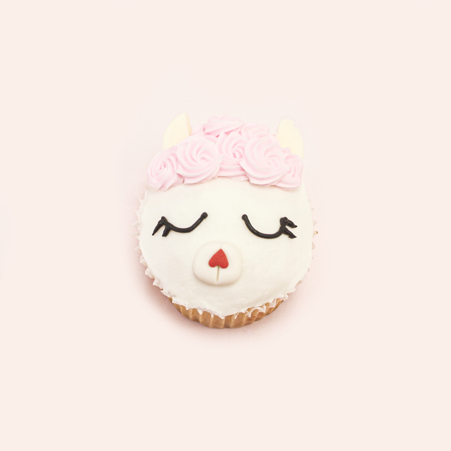 Llama Love Cupcake with buttercream swirl hair and sprinkle heart nose