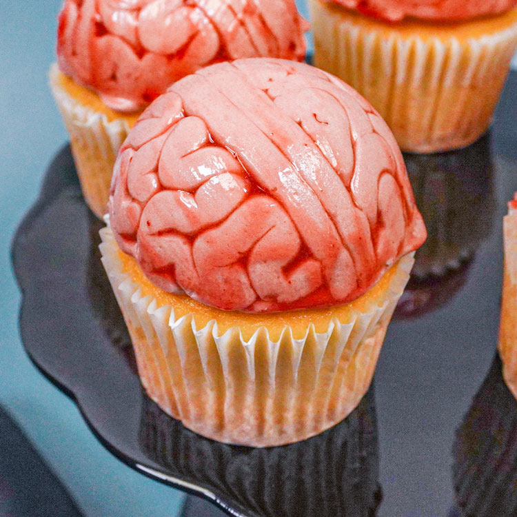 realistic piped brains on a cupcake
