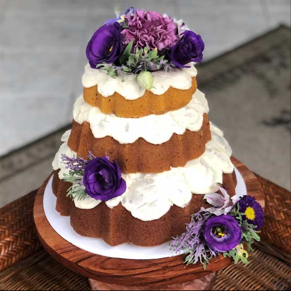 three-tier purple bundt wedding cake