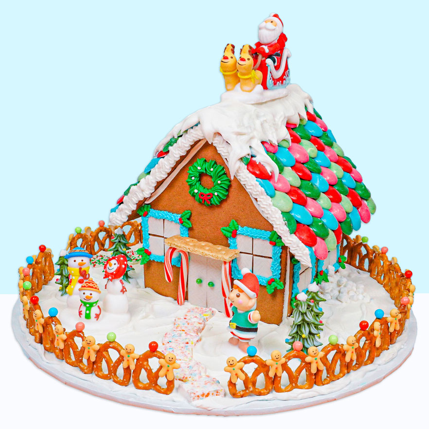 gingerbread house decorated with premade edible icing decorations