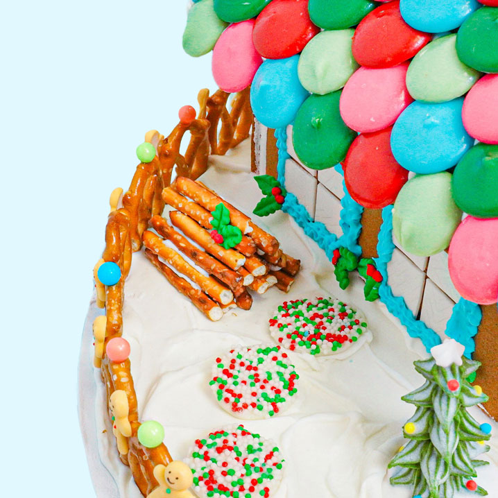 gingerbread house decorated with premade edible icing decorations