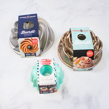 three different styles of nordic ware brand bundt cake pans