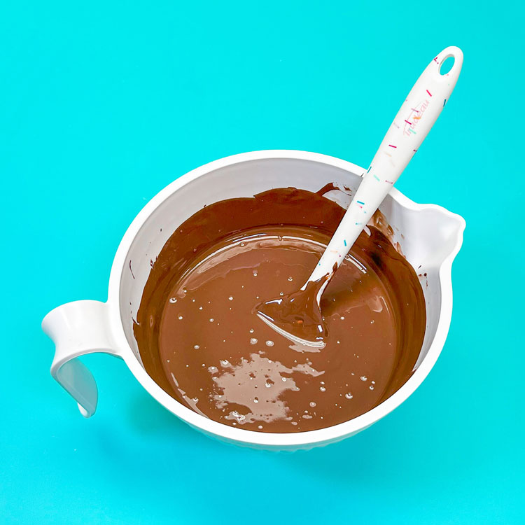 milk chocolate candy melts melted in a bowl