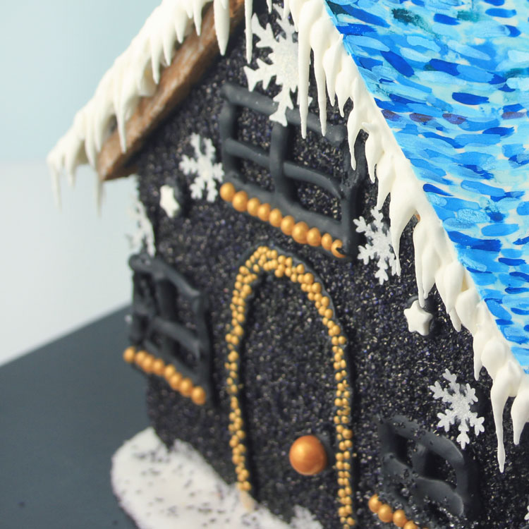 black sugar coated gingerbread house with starry Van Gogh