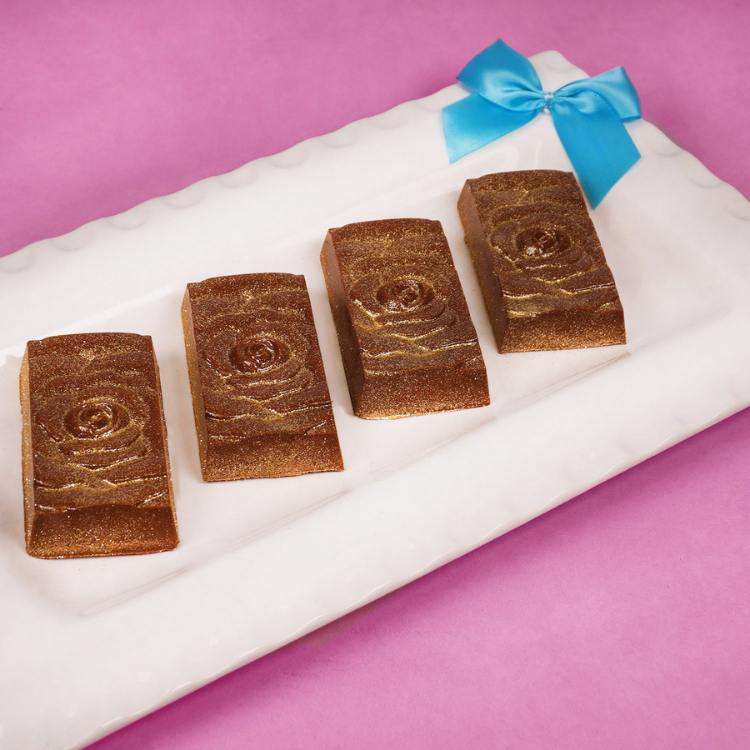 four candy bars created with the rose bar bwb chocolate mold