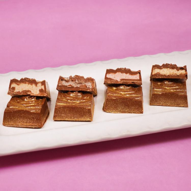 chocolate bars sliced in half to show their fillings