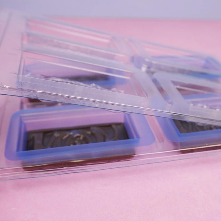 adding top piece of bwb chocolate mold