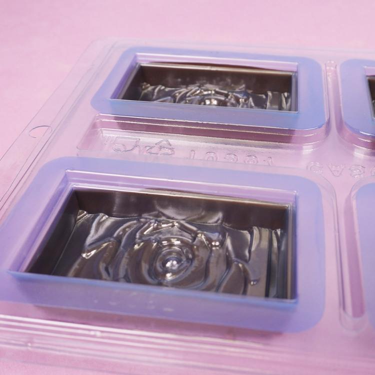 adding top piece of bwb chocolate mold