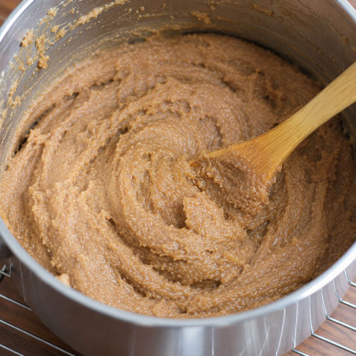 A batch of grainy fudge in a pot.
