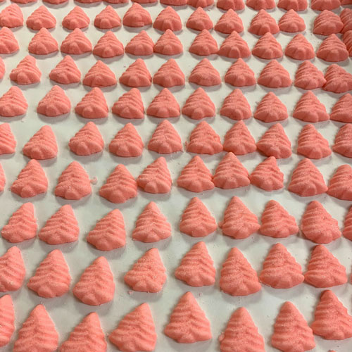 a tray of buttermints standing at room temperature to dry