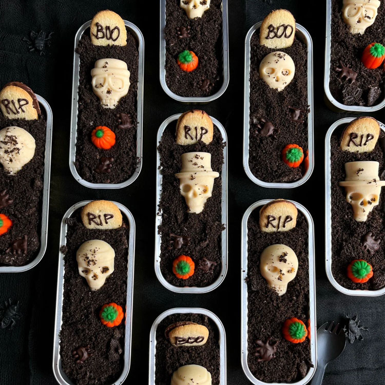 mini loaf cakes decorated like graveyards