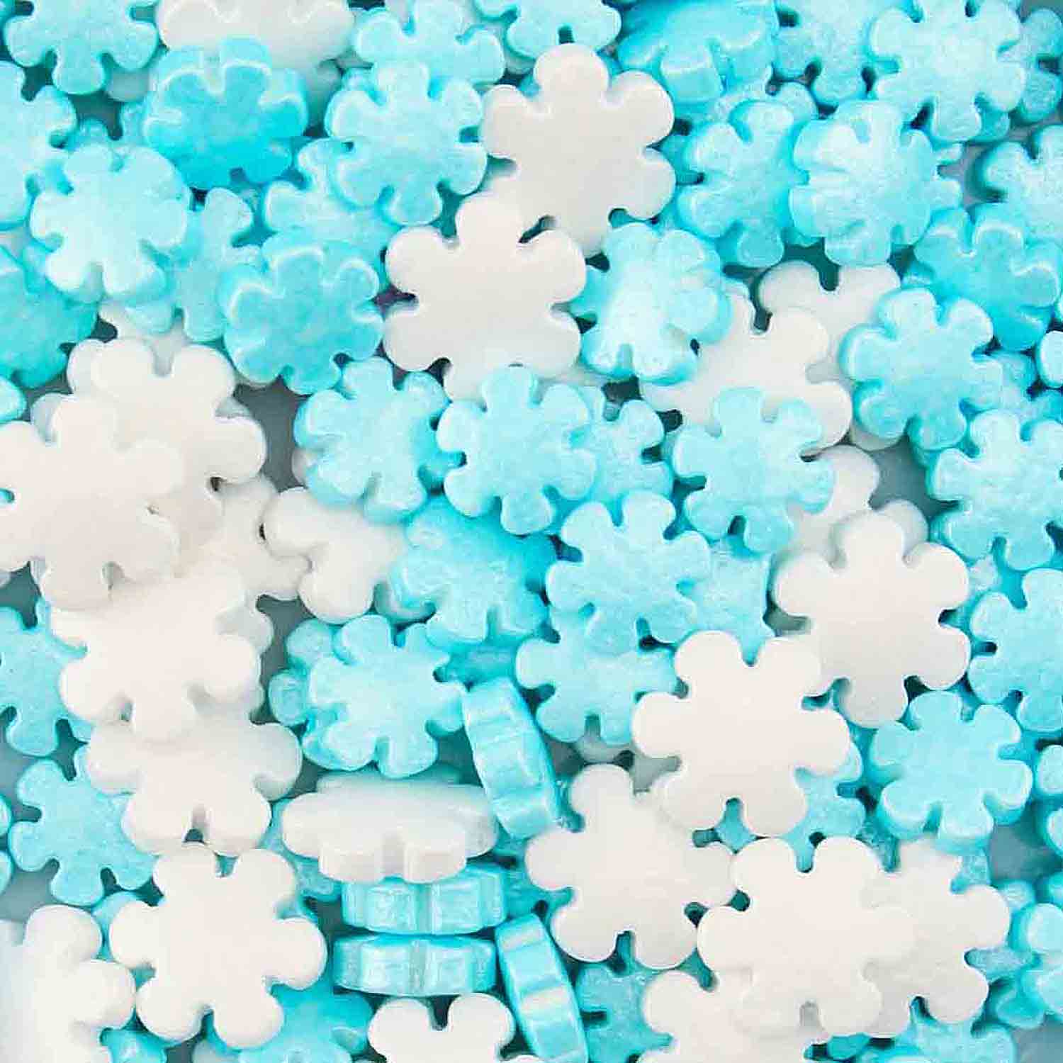 White And Blue Snowflake Sprinkles by Stocksy Contributor Pixel