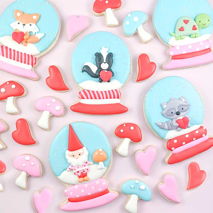 Valentine Snowglobe Cookies with different characters inside, gnome, fox, squirrel, turtle