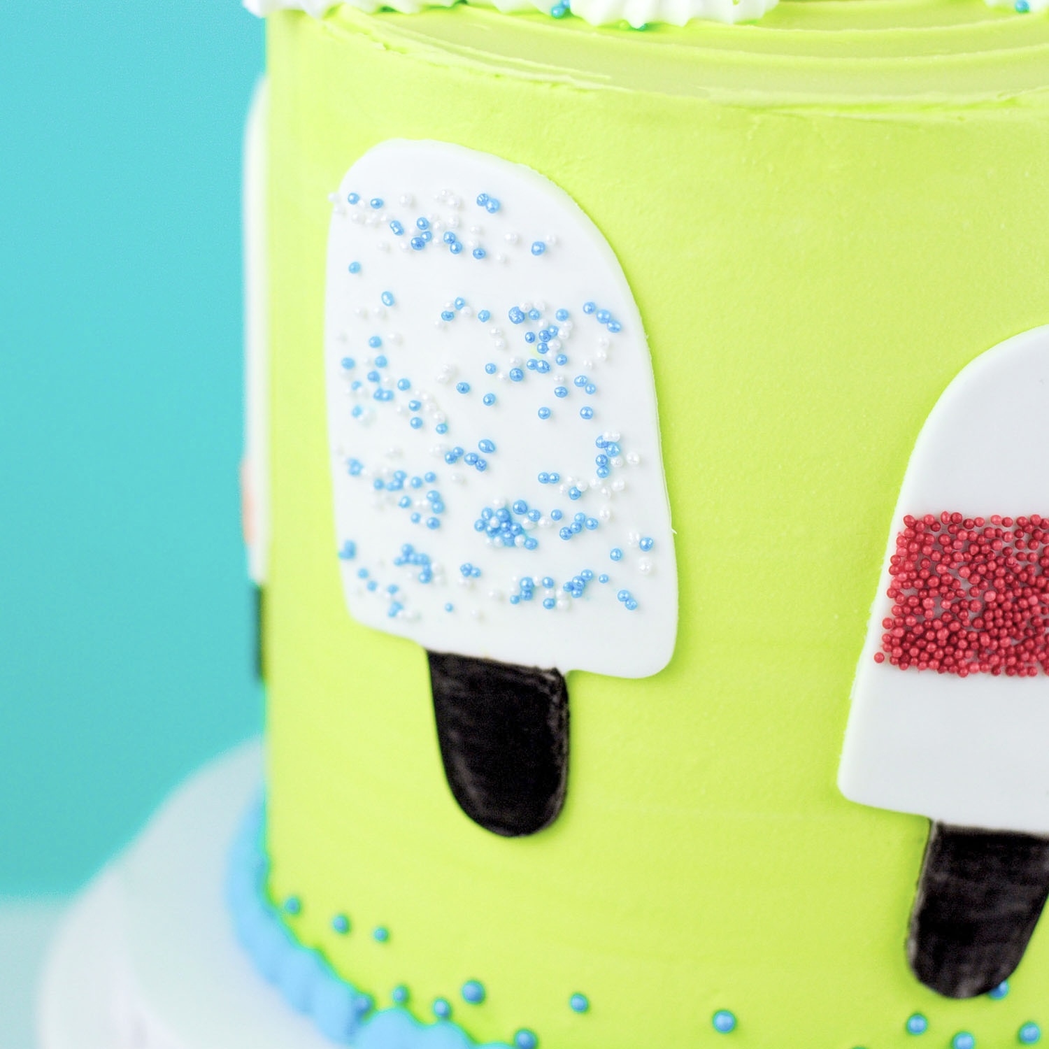 fondant popsicle on side of Father's Day Cake World's Best "Pop"