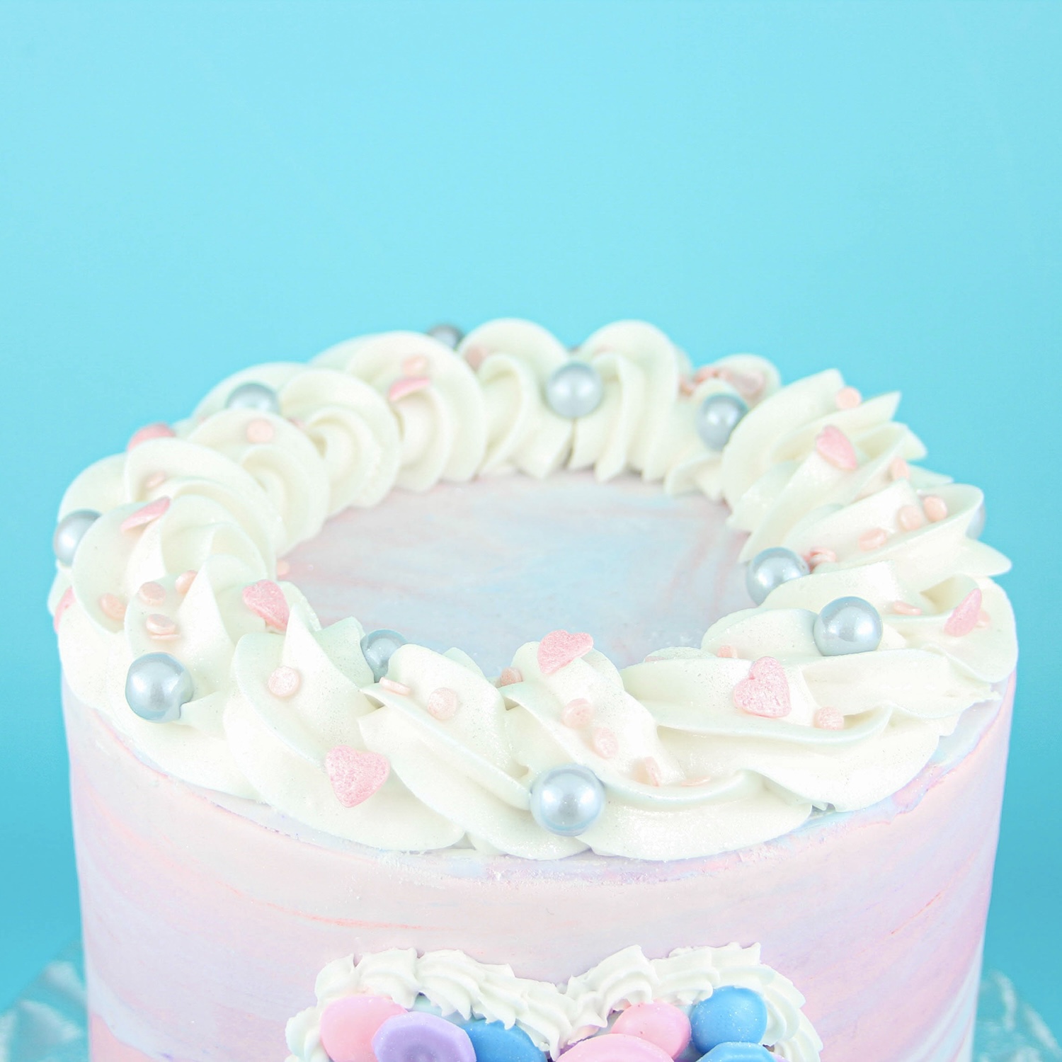 Features the buttercream spiral border on top of cake