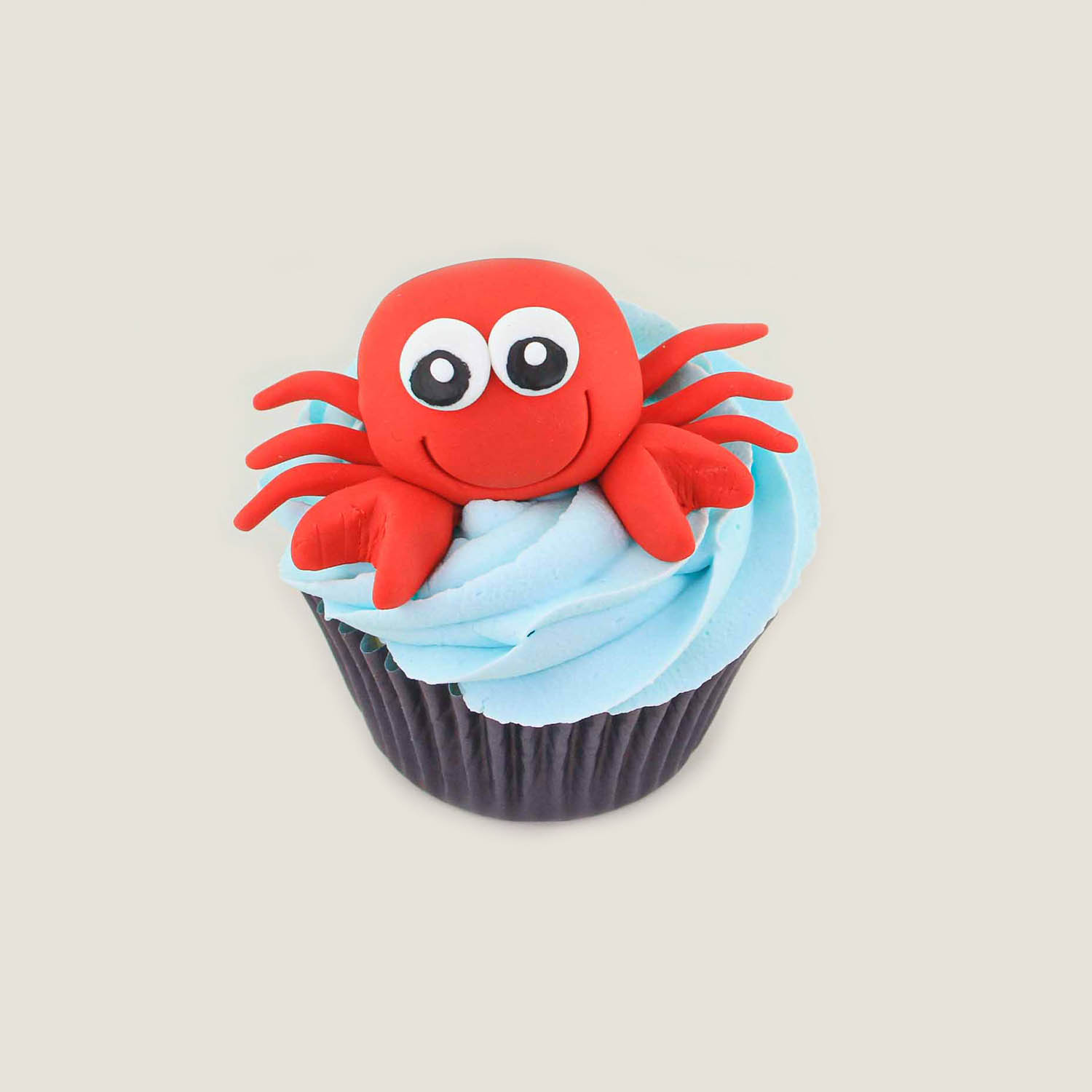 Hand sculpted fondant crab cupcake topper