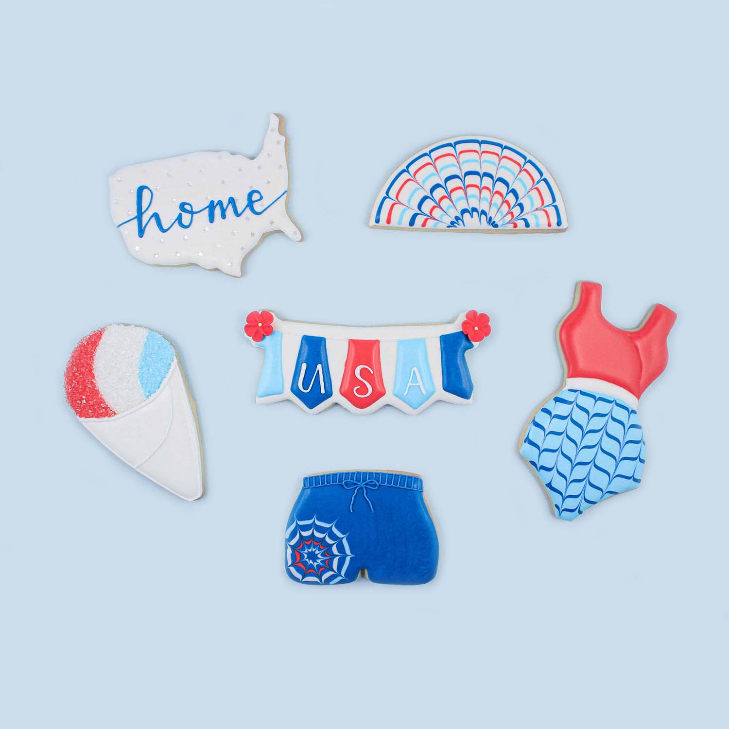 Collections of Decorated Patriotic Sugar Cookies, Country of USA Cookie, Banner Cookie,  Swim trunk and swimsuit cookie and snowcone cookie.