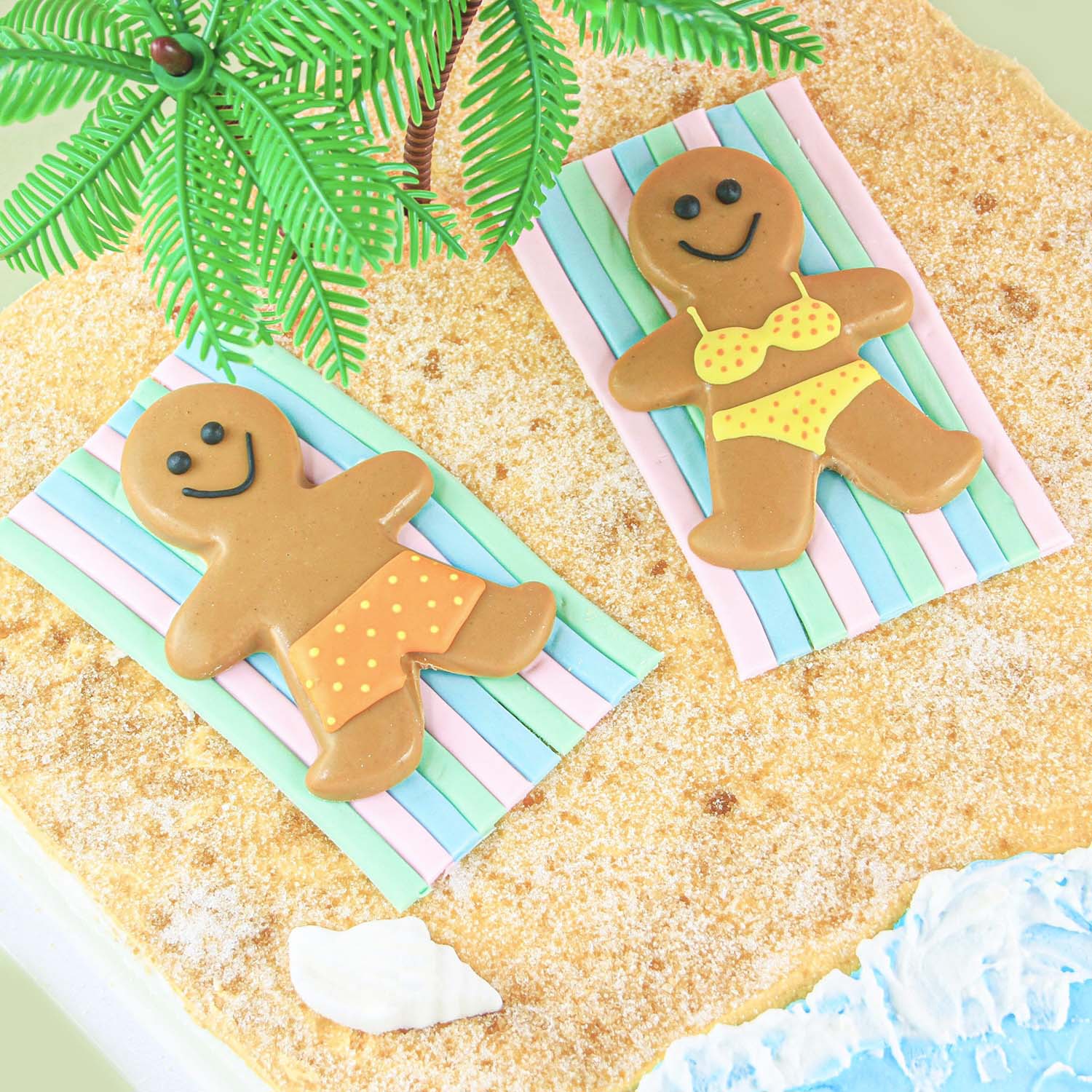 gingerbread boy and girl at beach cake