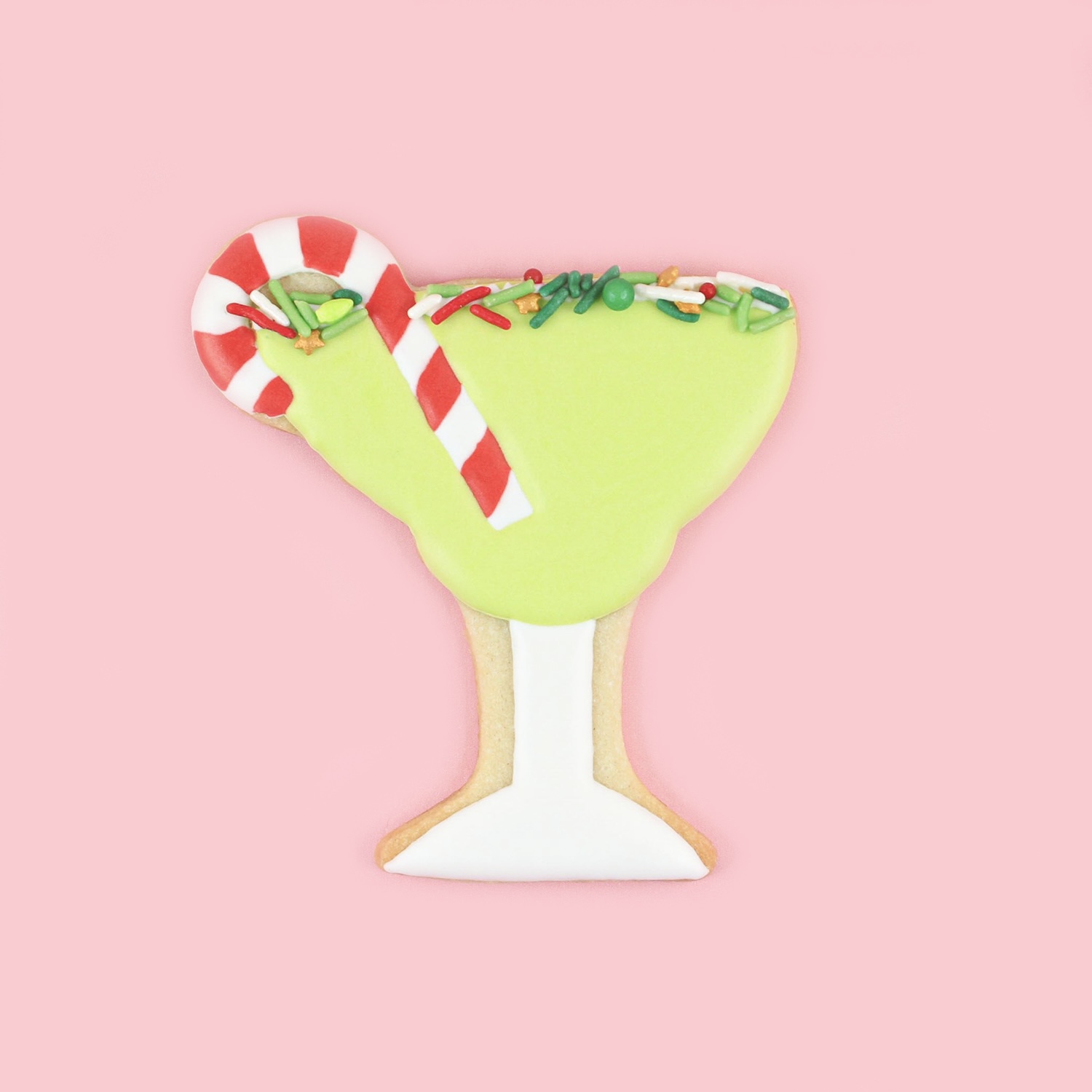 Royal icing decorated margarita cookie adorned with a candy cane