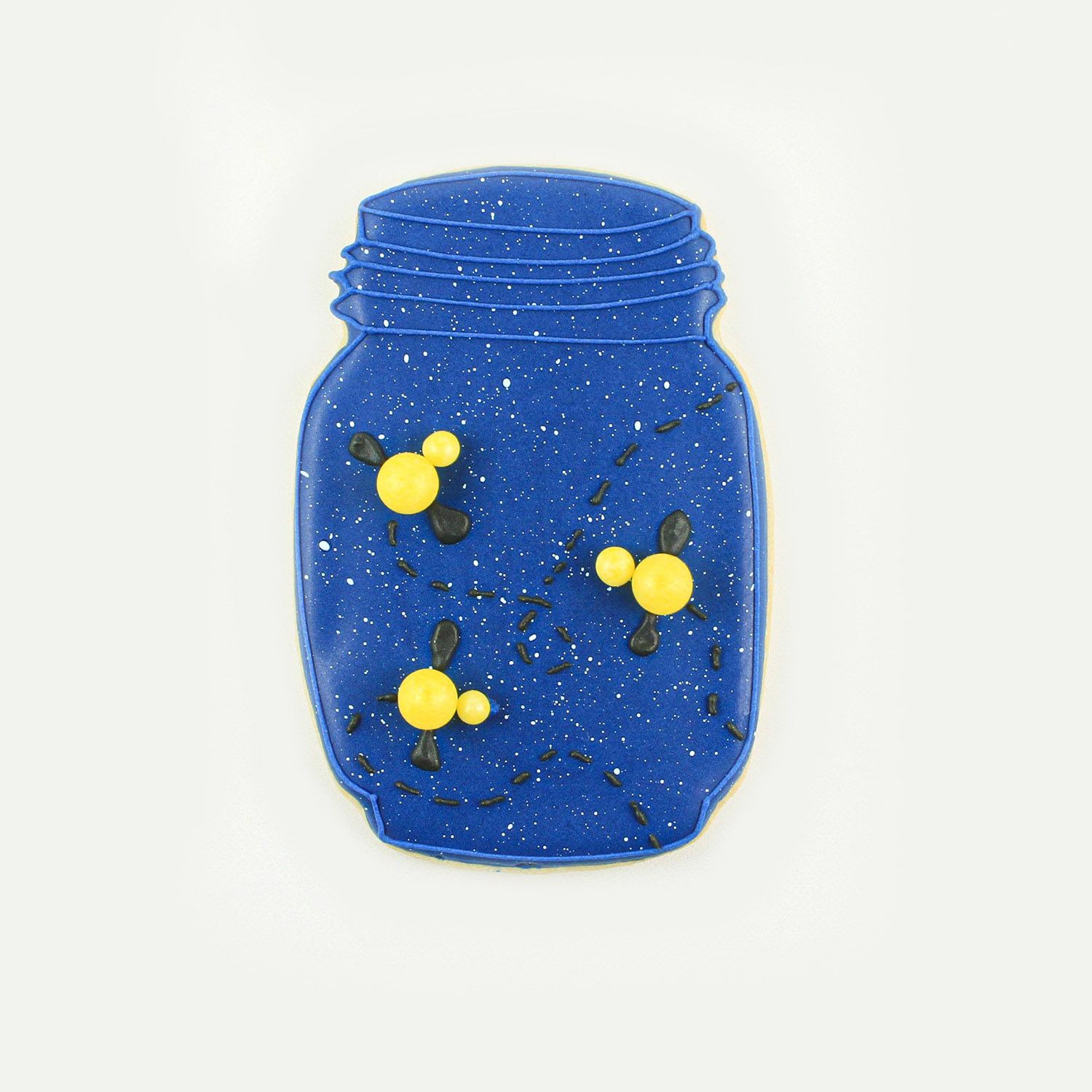 Mason Jar Cookie piped in navy blue royal icing, white splatter, fireflies made of candy pearls and flight patterns