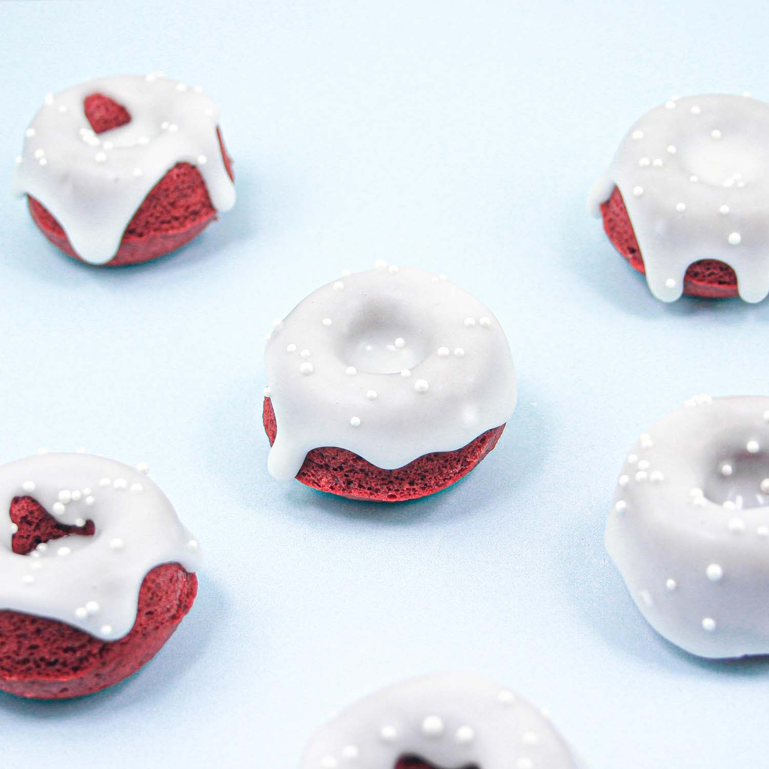 red velvet donuts with a cream cheese glaze