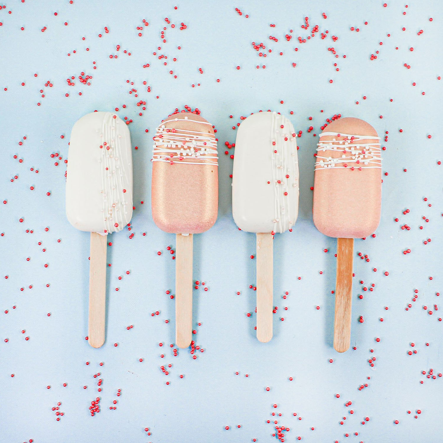 rose gold and white cakesicles