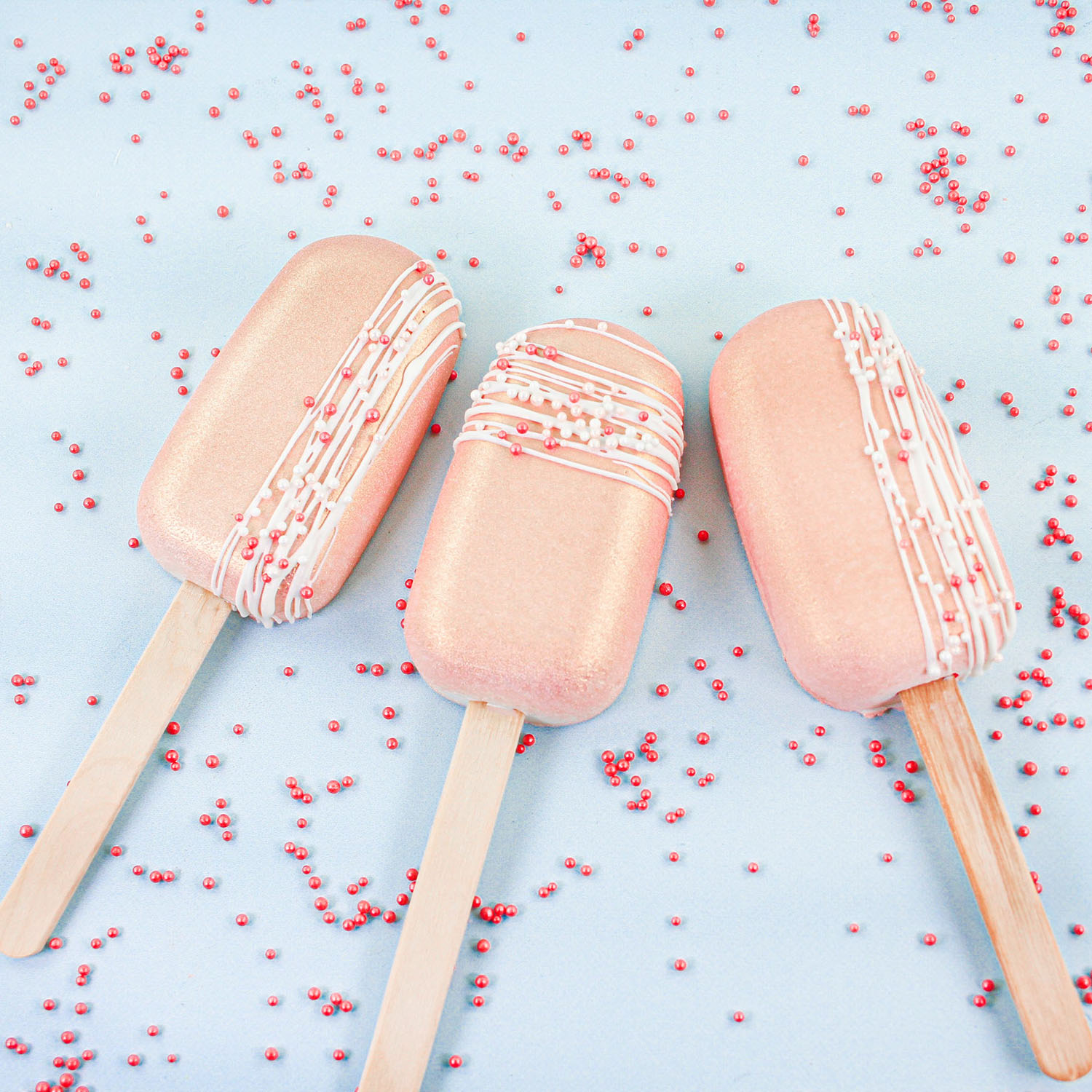 rose gold and white cakesicles for Valentines or Weddings