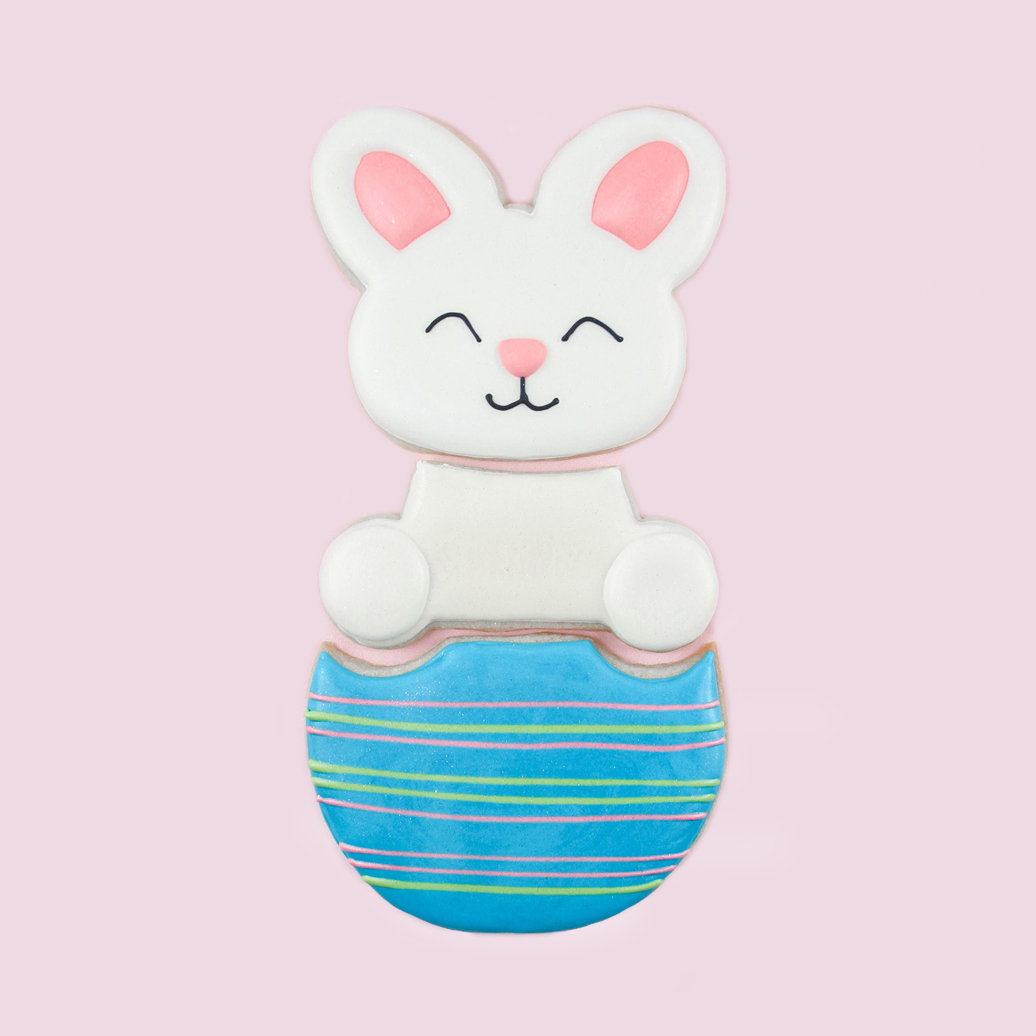 3-part royal icing decorated bunny and body in easter egg cookie