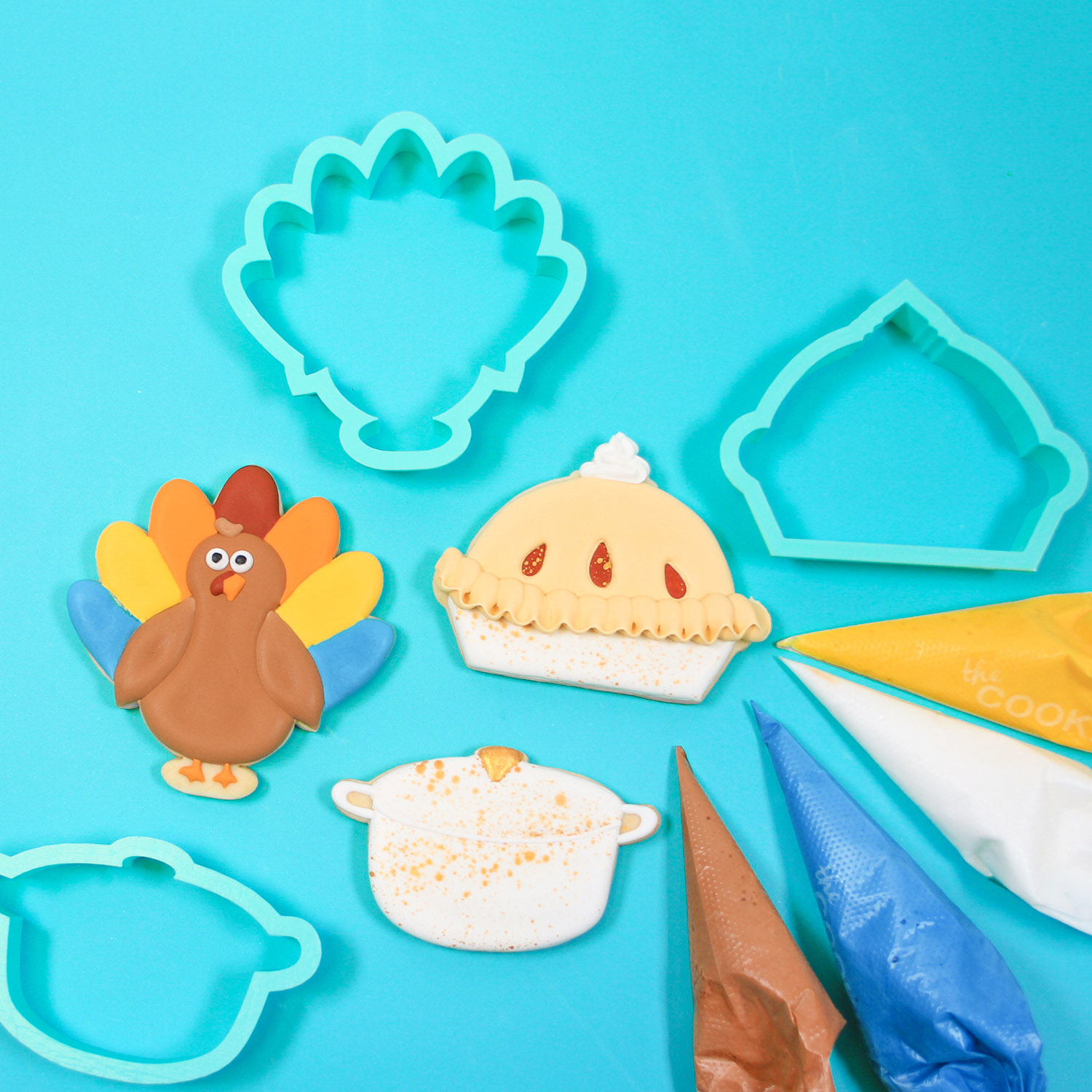 Turkey, Pie and Dutchoven decorated cookies in royal icing for thanksgiving