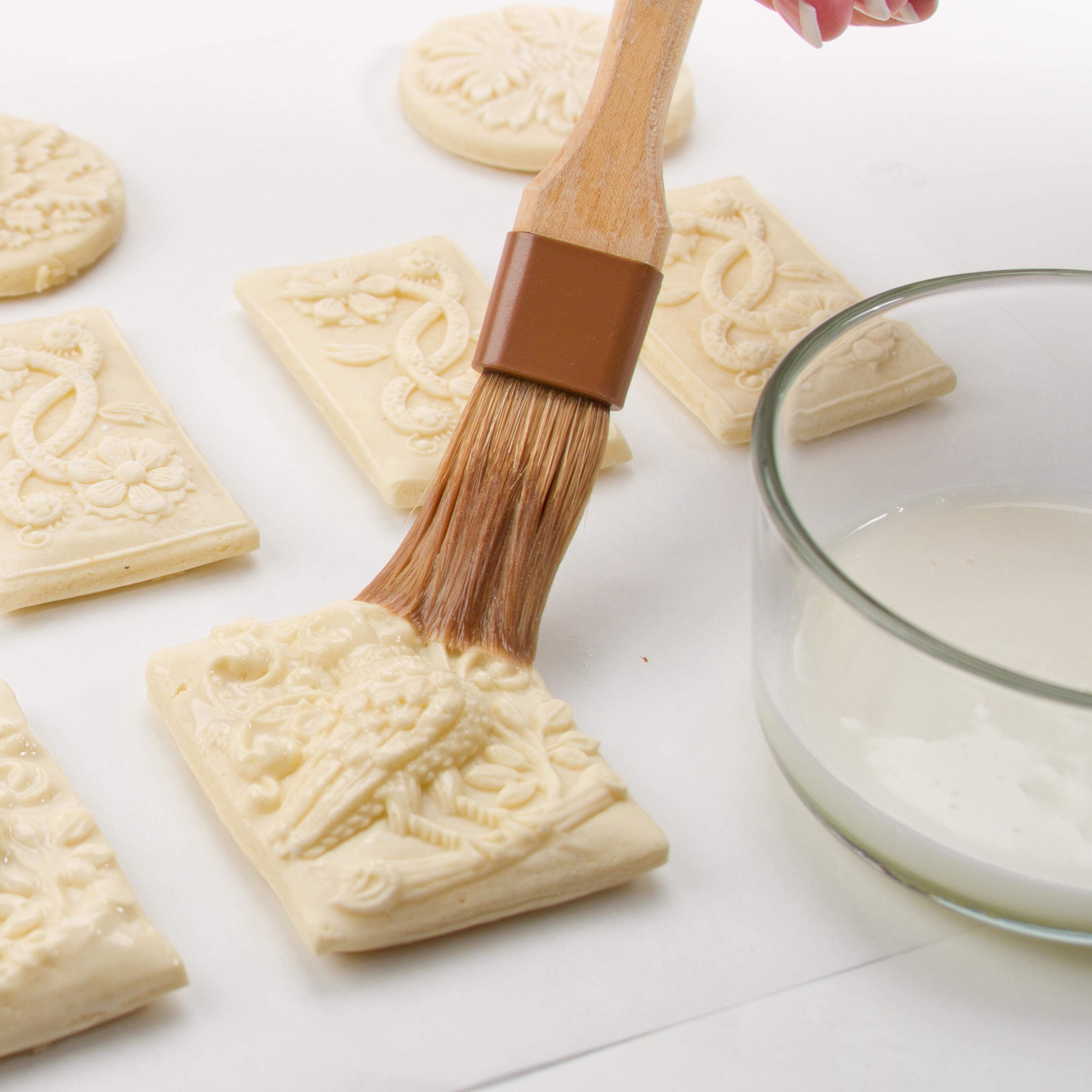 Egg Wash Glaze Onto Cookie with Pastry Brush