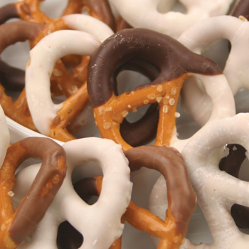 Chocolate dipped pretzels in white, milk and dark chocolate.