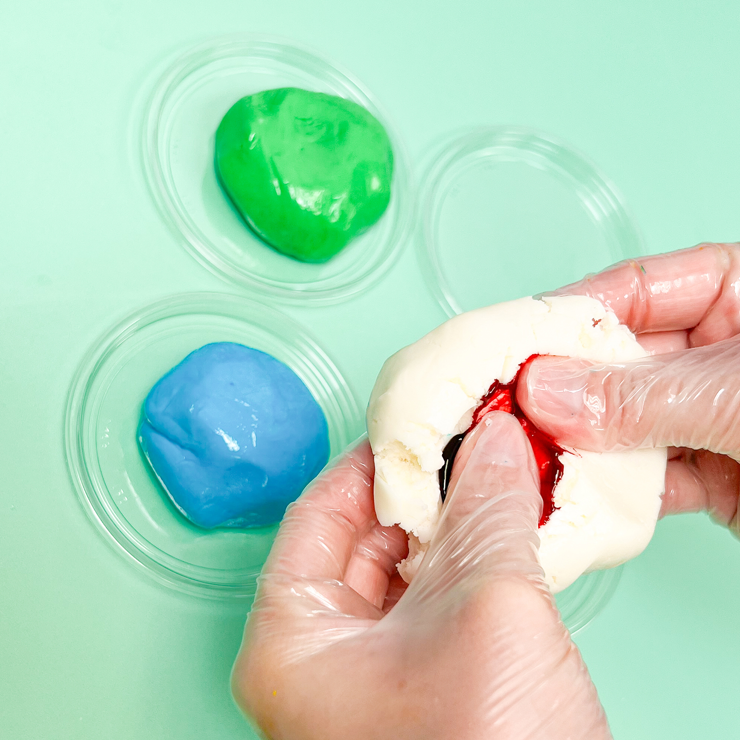 mixing food coloring into dry fondant candy center