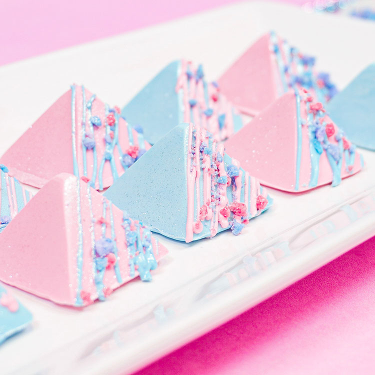 blue and pink chocolate pyramids with cotton candy crunch
