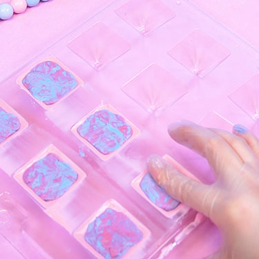 filling chocolate shells with cotton candy dry fondant filling