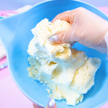 dry fondant candy center mixed in a bowl