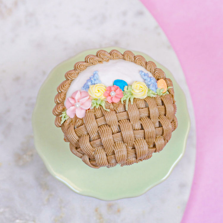 cupcake decorated with basketweave and flowers for Easter