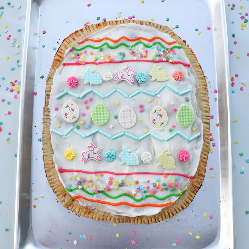 easter egg poptart with edible decorations on a baking sheet