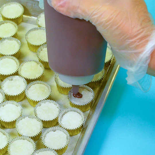 sealing candy with melted dark chocolate