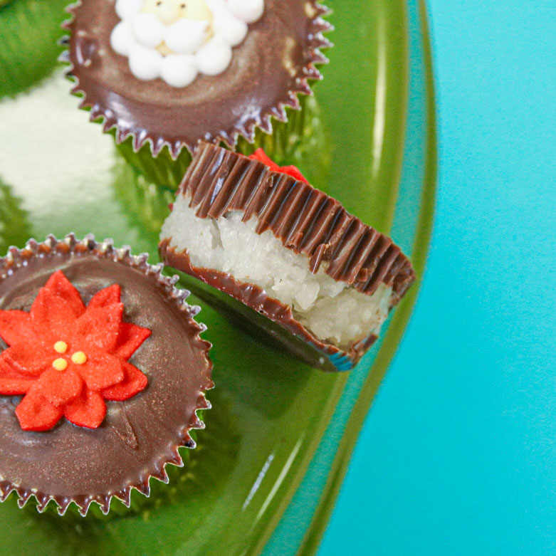 chocolate and coconut in candy cups decorated with christmas decorations