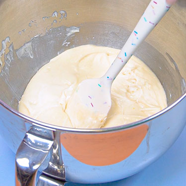 vanilla cake batter in a mixing bowl