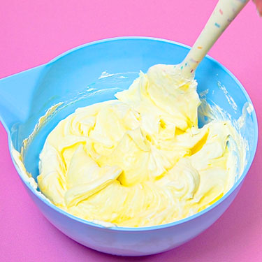 bowl of lemon frosting