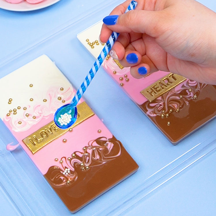 adding sprinkles to back of chocolate bar