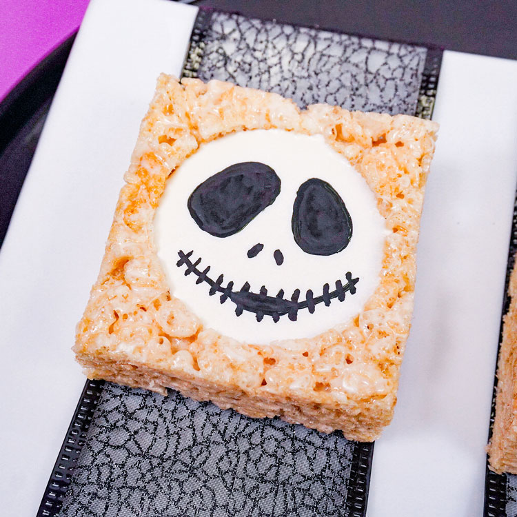 jack skellington dessert on striped plate