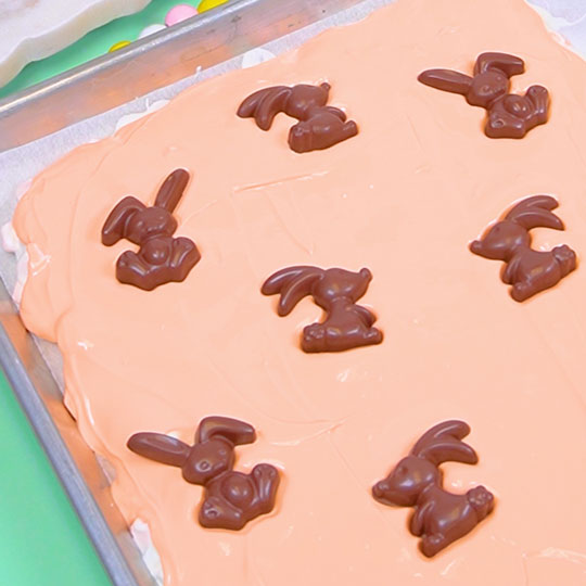 adding chocolate bunnies onto chocolate bark