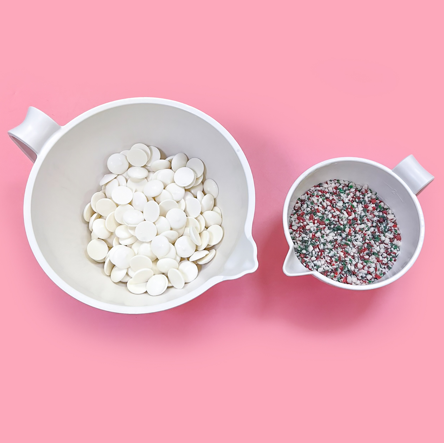bowl of white candy melts and bowl of peppermint crunch