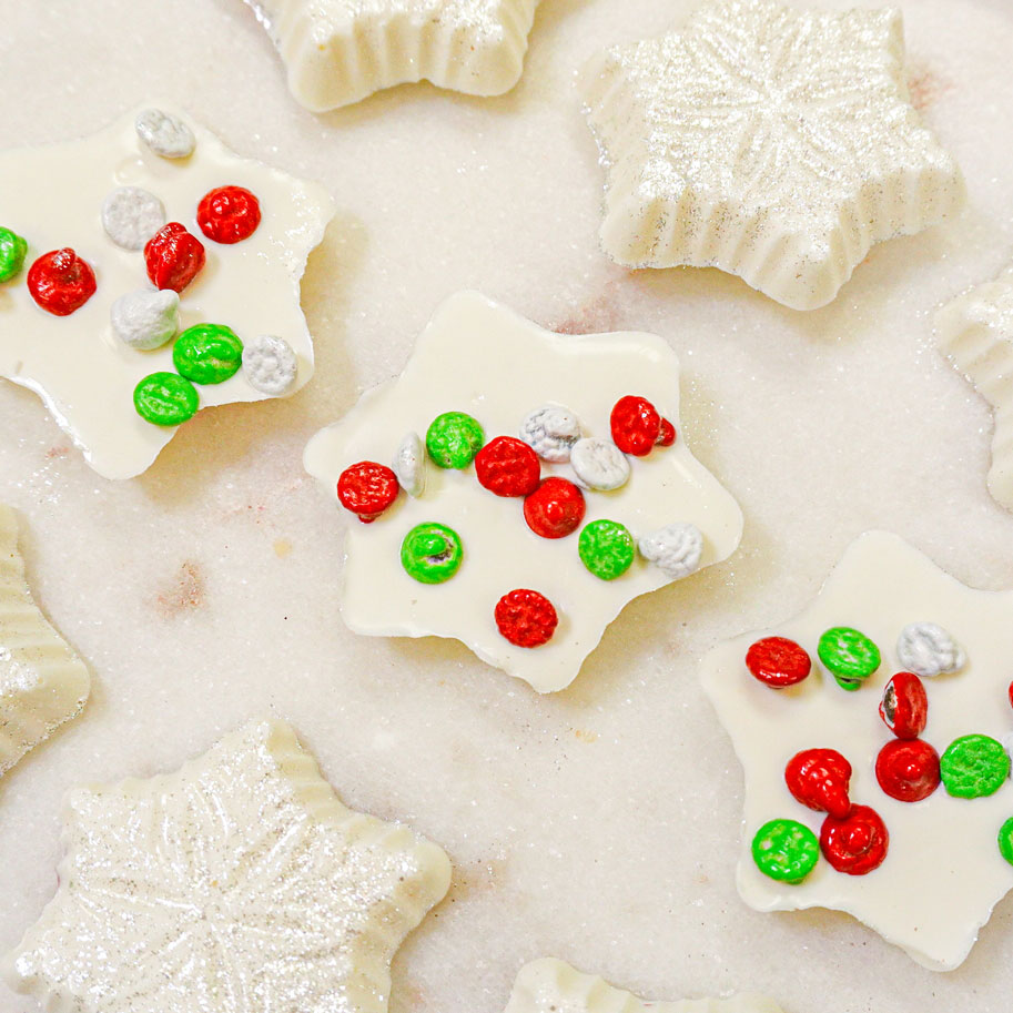 white chocolate snowflake covered in edible glitter