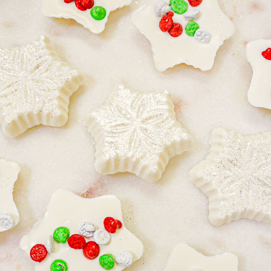 white chocolate snowflake with green red and white chocolate chips