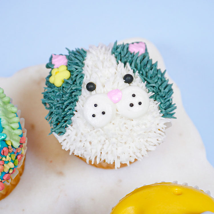 cupcake decorated to look like a cat