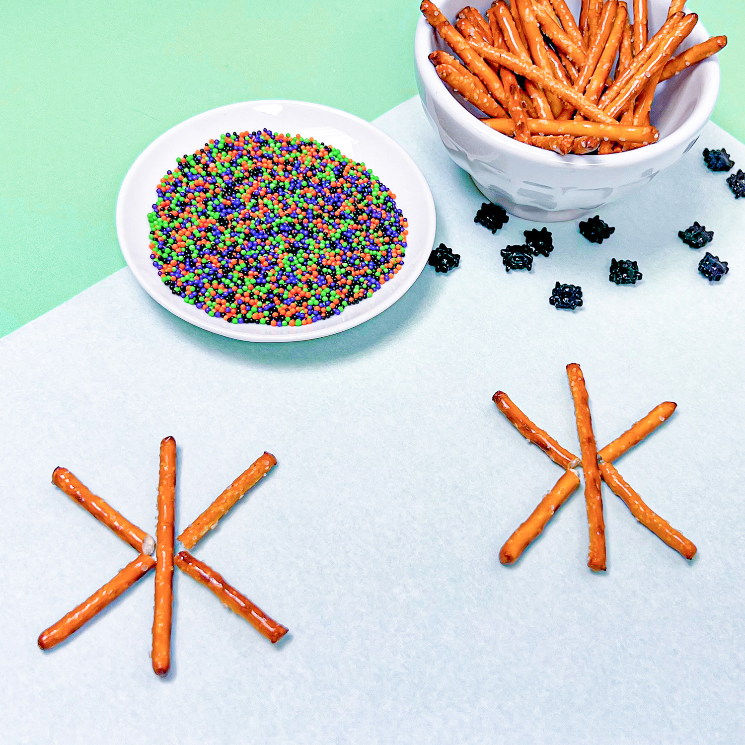 pretzel stick webs on parchment paper