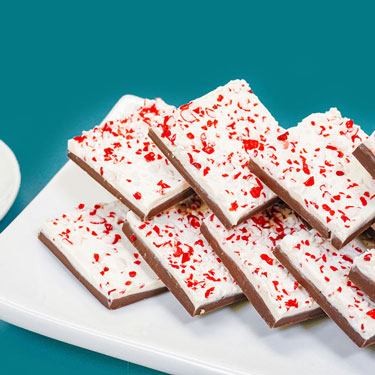 green and red peppermint bark on platter